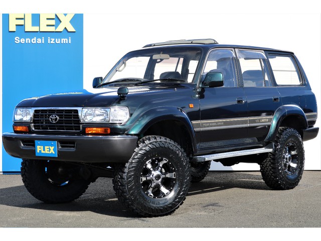 Ｈ６年式、中期型、ＶＸリミテッドグレードの入庫です♪リフトアップ、大径のＡＷ＆タイヤでワイルドな仕様でカスタム済の車両ですよ！これぞ４ＷＤ車といえる迫力ある外観！他にはない所有感を是非ご体感ください♪