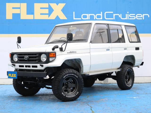 純正ホワイト☆ＺＸ☆３ＵＰ☆ブラＶ１６インチ☆ＢＦＧ２４５タイヤ☆輸出仕様７６フェイスグリル☆フェンダーミラー☆前後クロカンバンパー☆社外ＳＤナビ☆ＥＴＣ☆