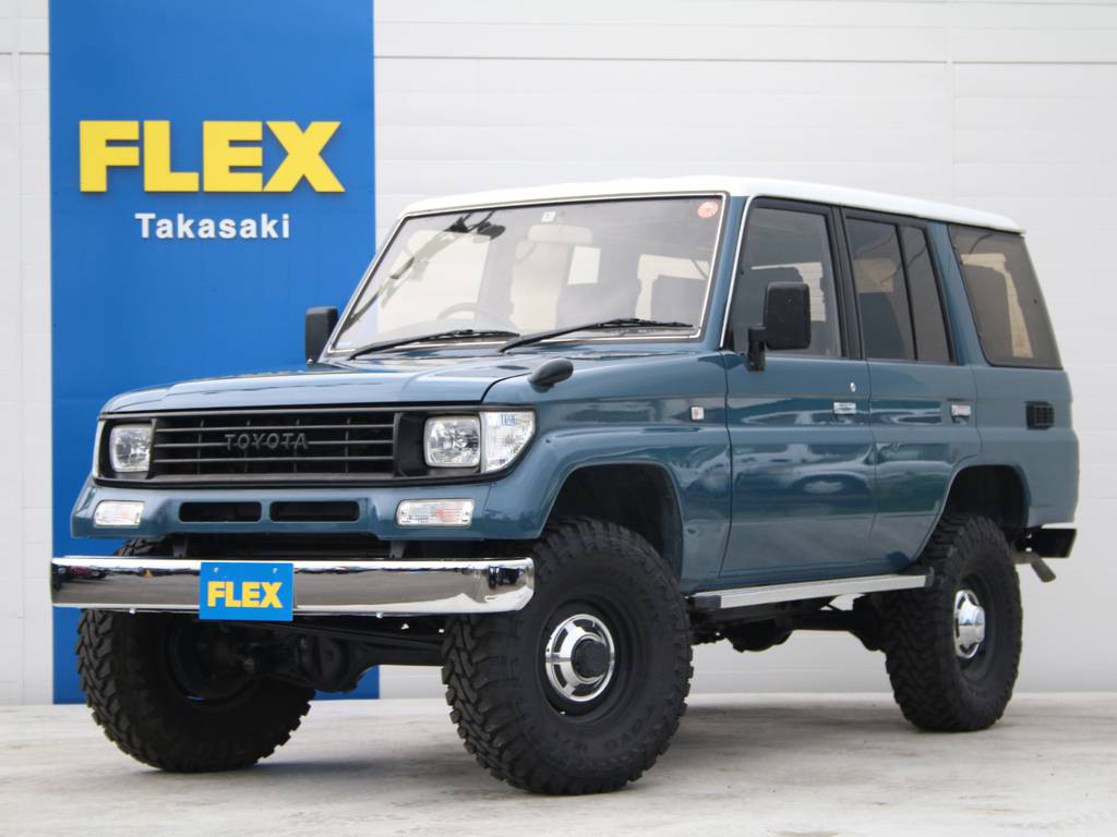 買取直販車☆オールペイントアルルブルー☆２インチリフトアップ☆輸出用１５インチホイール☆オープンカントリーＭＴタイヤ☆ナロー換装☆新品メッキバンパー☆社外キーレス☆社外ナビ☆ＥＴＣ☆