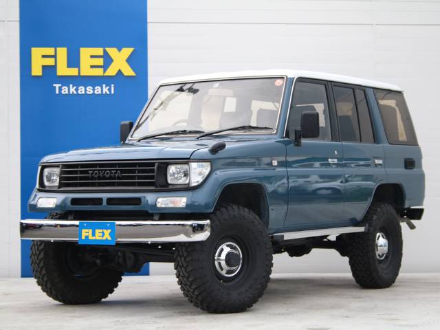 買取直販車☆オールペイントアルルブルー☆２インチリフトアップ☆輸出用１５インチホイール☆オープンカントリーＭＴタイヤ☆ナロー換装☆新品メッキバンパー☆社外キーレス☆社外ナビ☆ＥＴＣ☆
