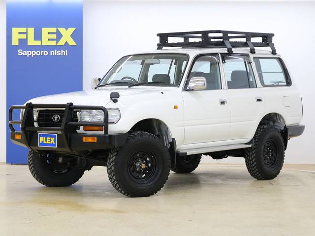 ホワイトNEWペイント☆寒冷地仕様☆５速マニュアル☆パートタイム４WD☆シートヒーター☆新品３インチアップ☆新品プロコンプショック☆ルーフキャリア☆デイトナホイール☆新品ジオランダーMT☆