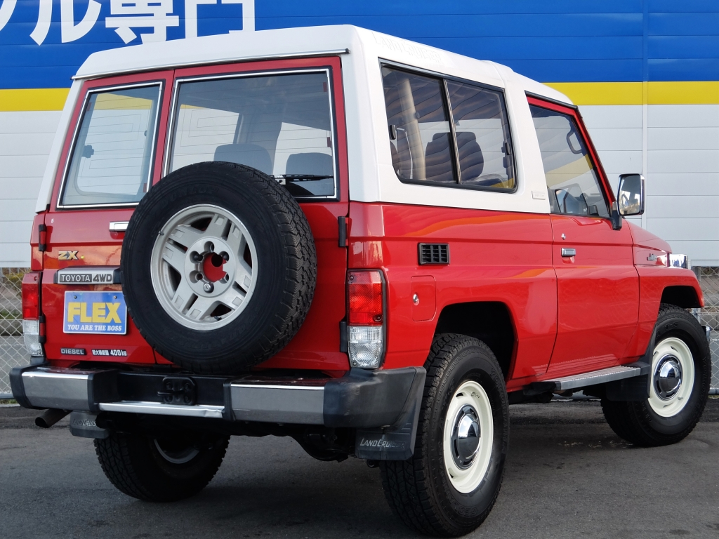 ランドクルーザー70 ランドクルーザー７３frpトップ Zx ４２００d お洒落で可愛い レッドボディー 最終型フェイス ホワイト塗装ホイール トヨタランドクルーザー70zx中古車 車探しなら中古車 新車の専門店flex フレックス へ