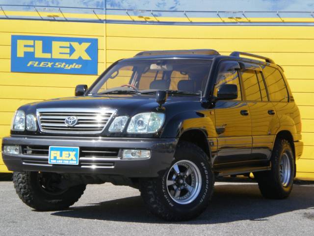 ランドクルーザーシグナス ランクル１００ ｕｚｊ１００ｗ ４７００ｇ シグナス 純正ブラックツートン 楽ナビ付き ａｓｃ１００付きリフトアップ トヨタ ランドクルーザーシグナスシグナス中古車 車探しなら中古車 新車の専門店flex フレックス へ